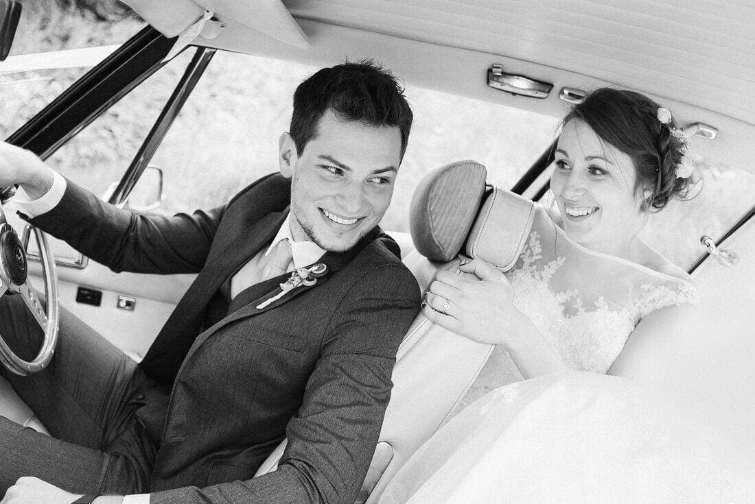 bride and groom take a drive as husband and wife