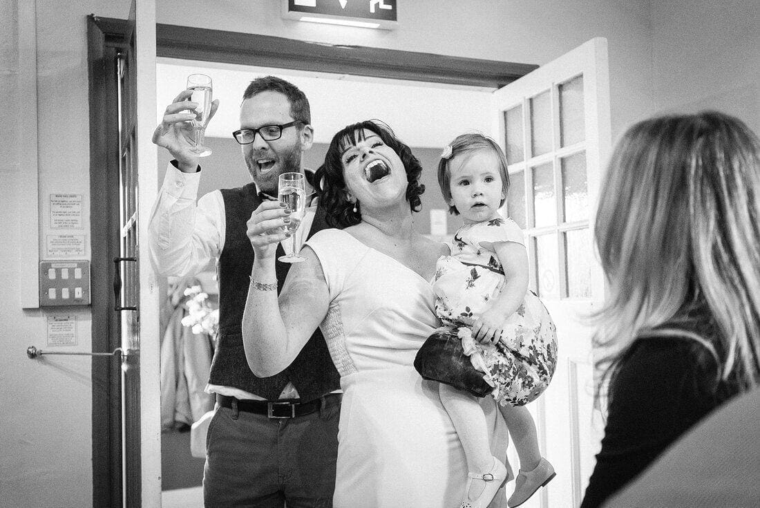 the entrance of the bride and groom and baby