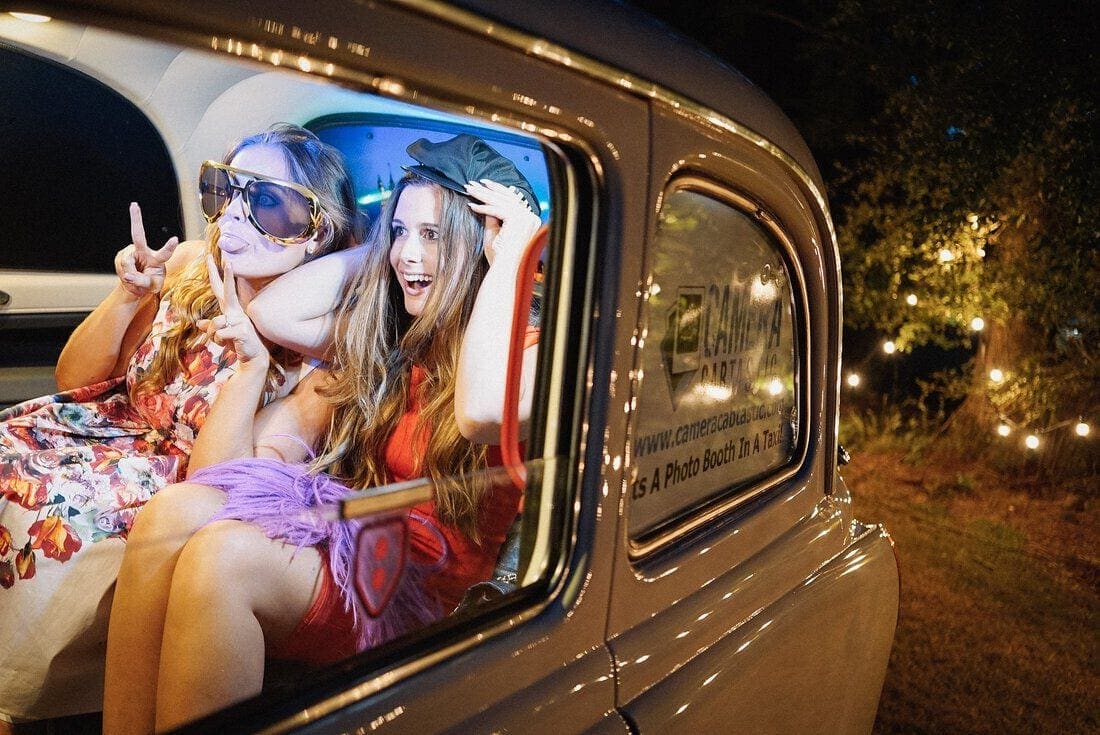 fun and laughter in the wedding Photo Booth