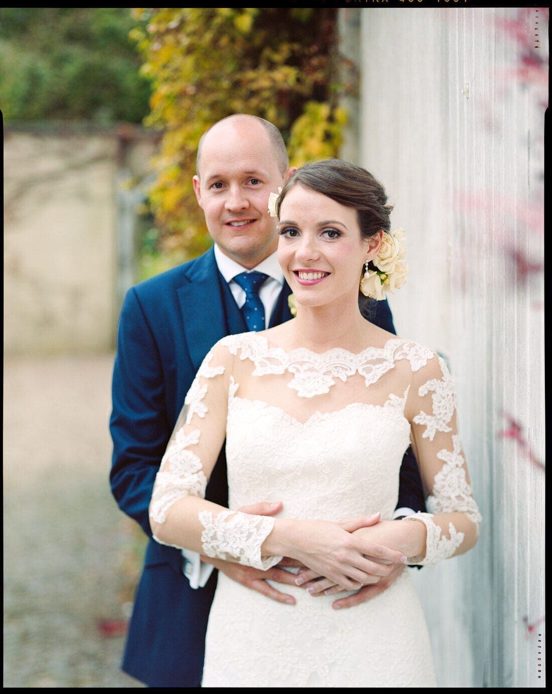 laura and mike pose for their northbrook park wedding photographer