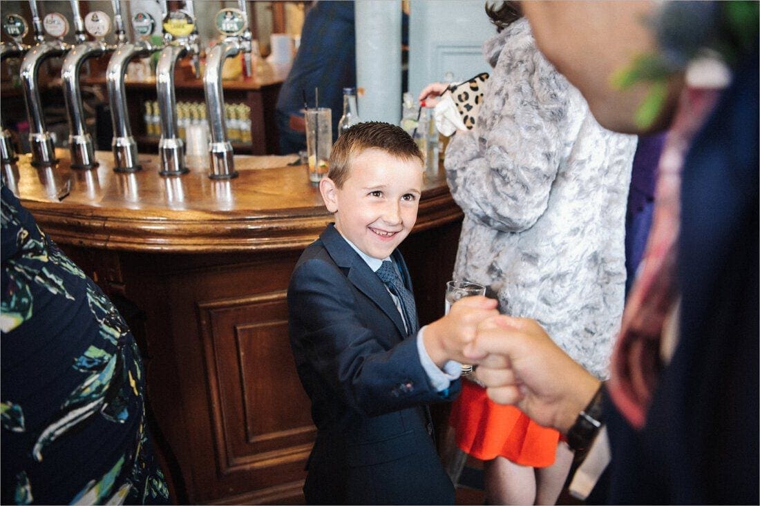 a fist bump with the groom