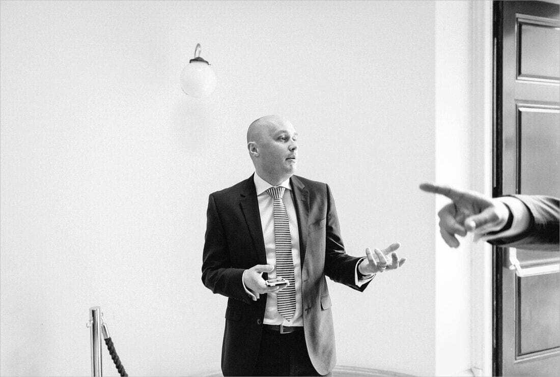 ushers wait for the bride to arrive