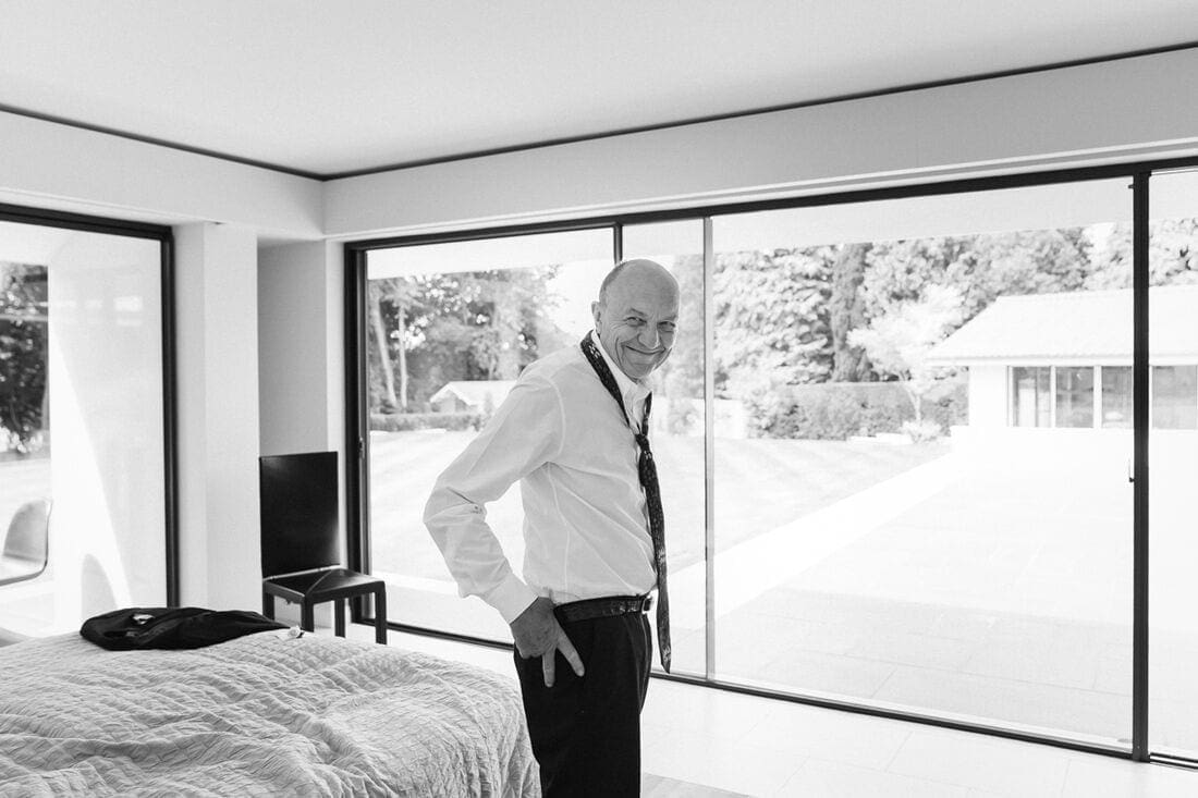 a proud dad sees his daughter's wedding dress for the first time