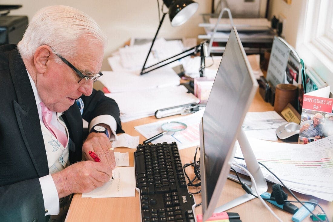 father of the bride makes last minute changes to his speech