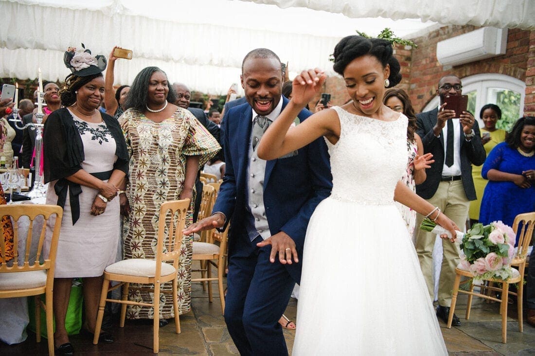 the entrance of the Nigerian bride and groom to their wedding reception