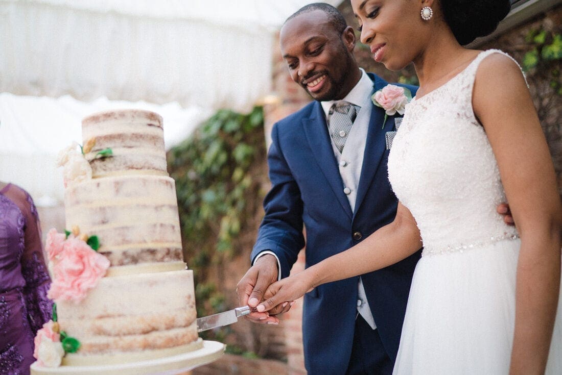 cutting the wedding cake at Northbrook Park
