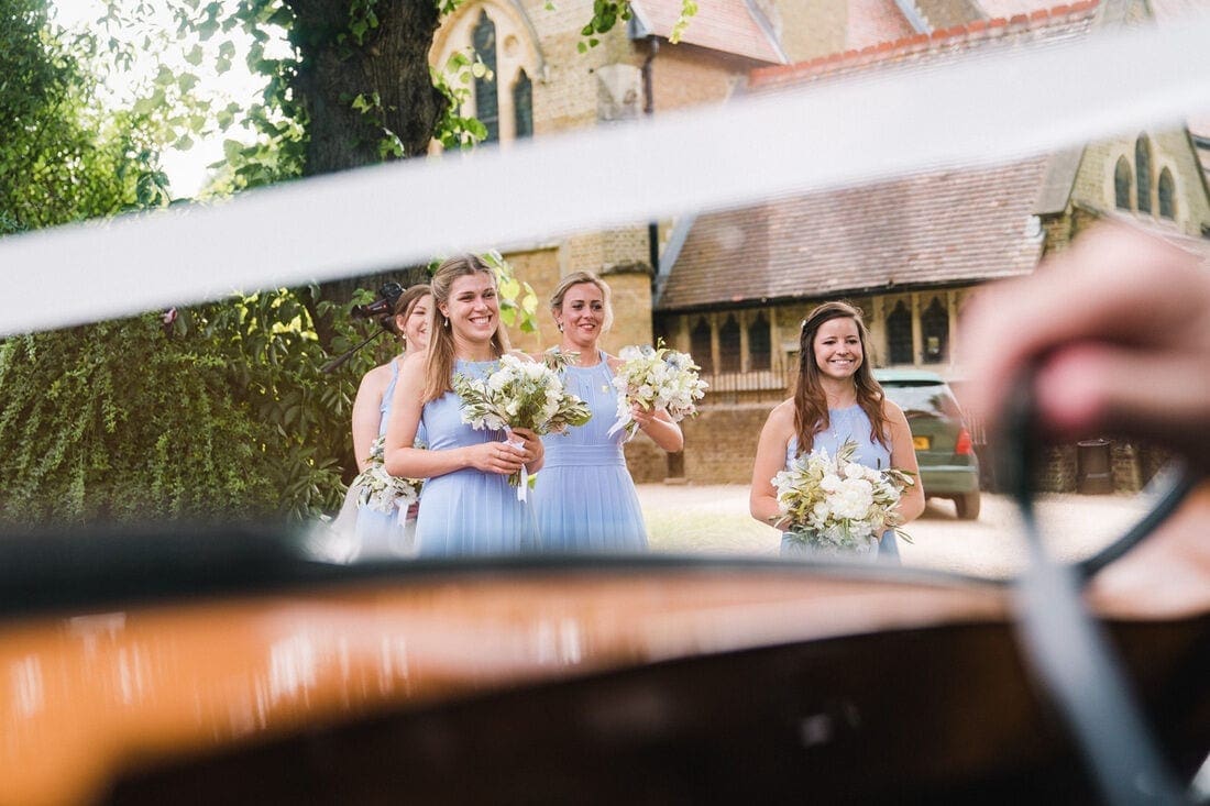the wedding car arrives at church in Putney