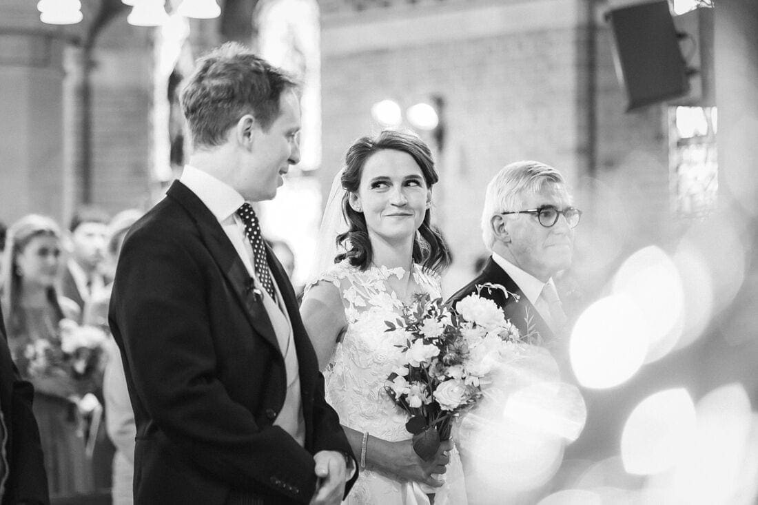 bride and groom first look at church in Putney