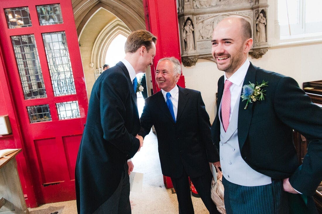a handshake for the groom before the ceremony