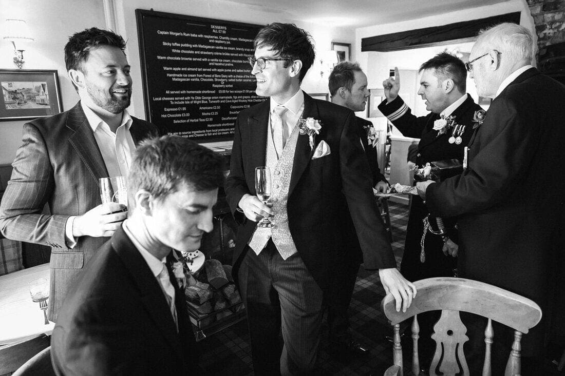 wedding guests meet at the pub