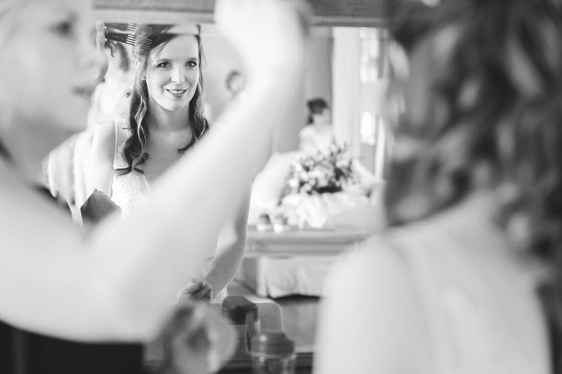 bride getting ready in the beautiful loosely park bridal suite