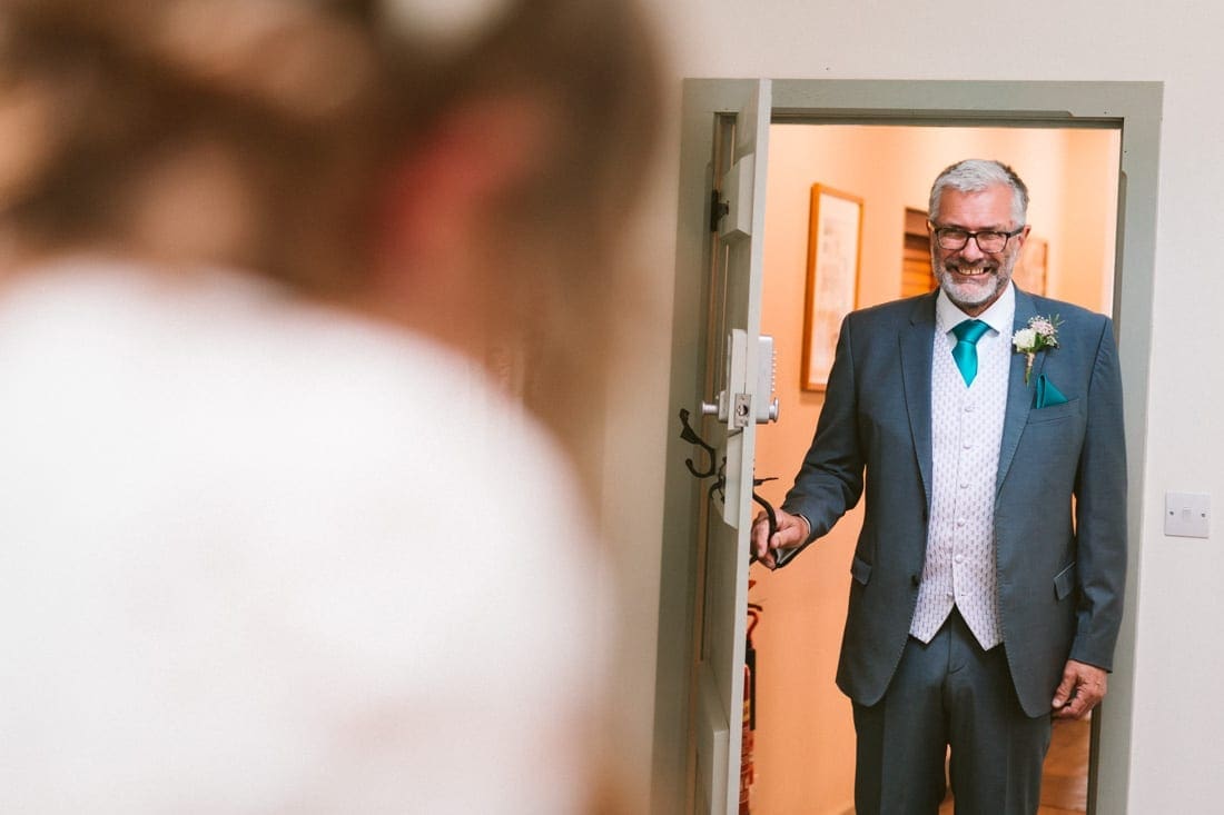 I love photographing the father of the bride's reaction