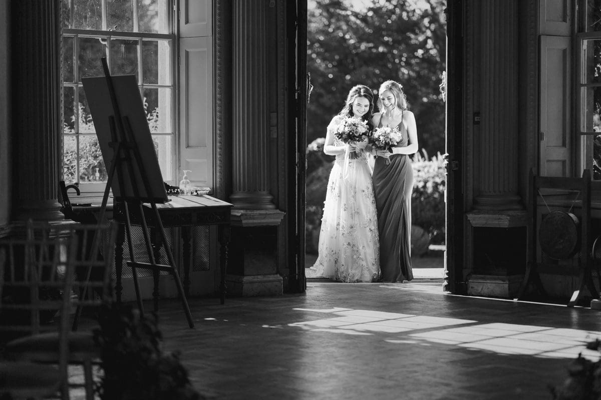 sisters at wedding ceremony