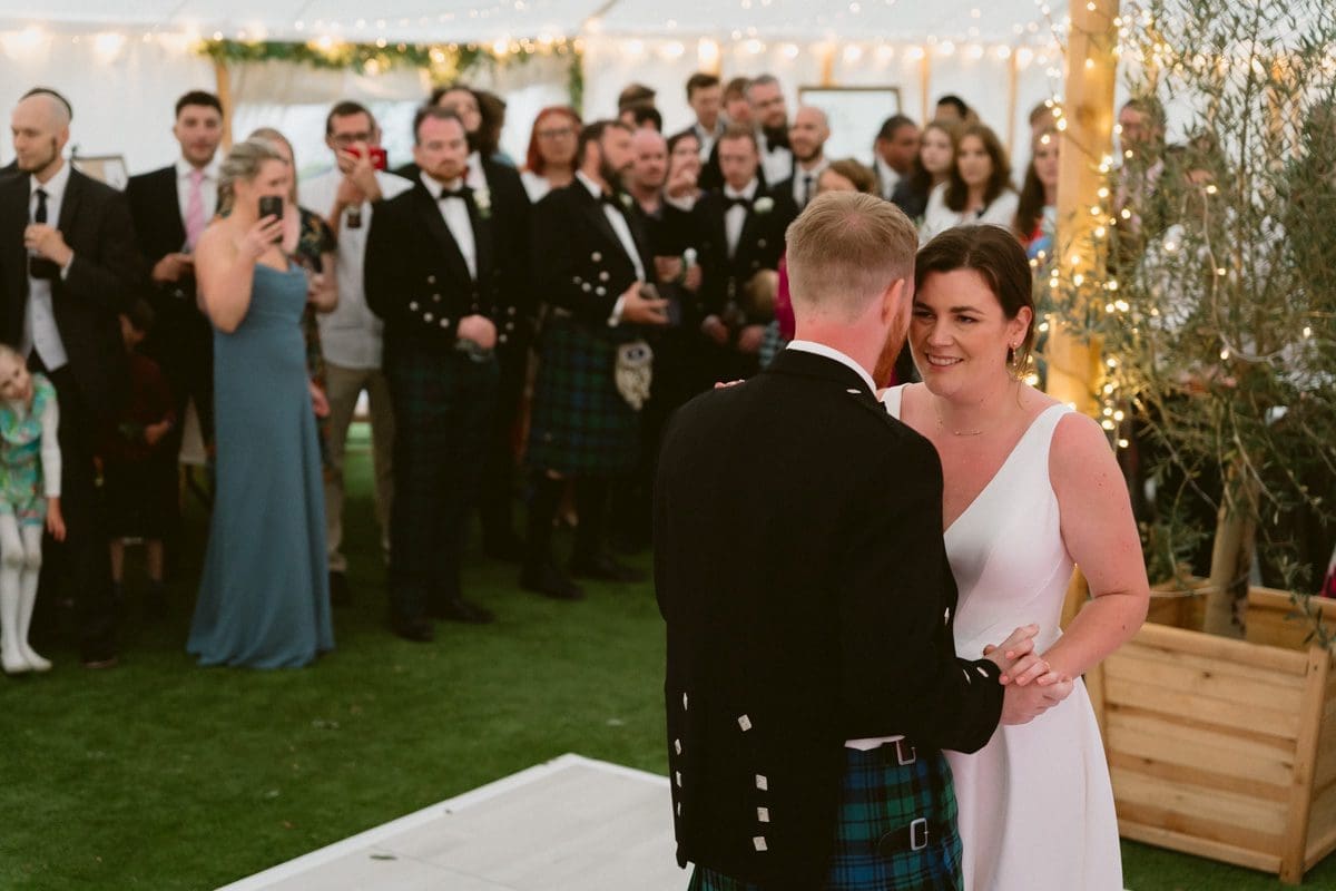 a couple's first dance at their Slslaugham place wedding