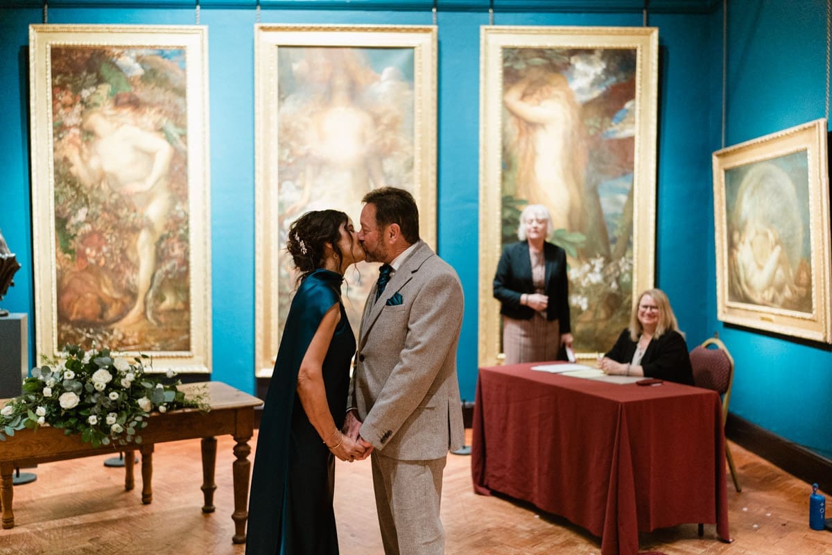 first kiss at Watts Gallery wedding
