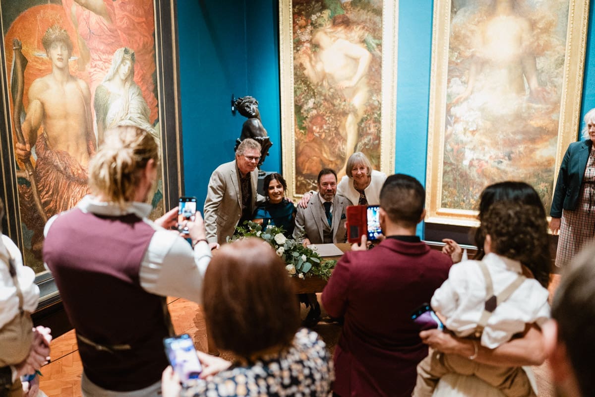 wedding guests taking photos