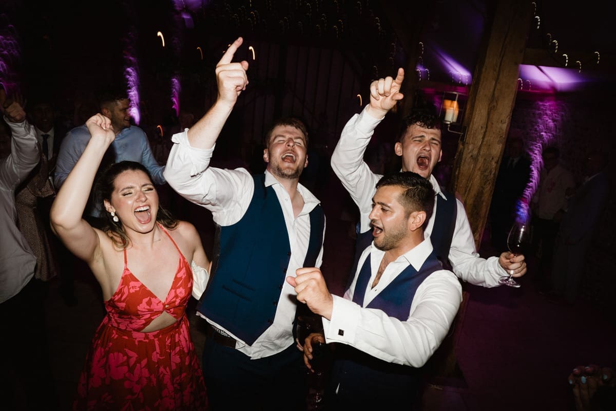 wedding guests partying at Upwaltham Barns