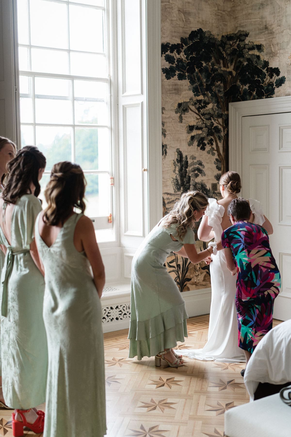 the wedding dress goes on.