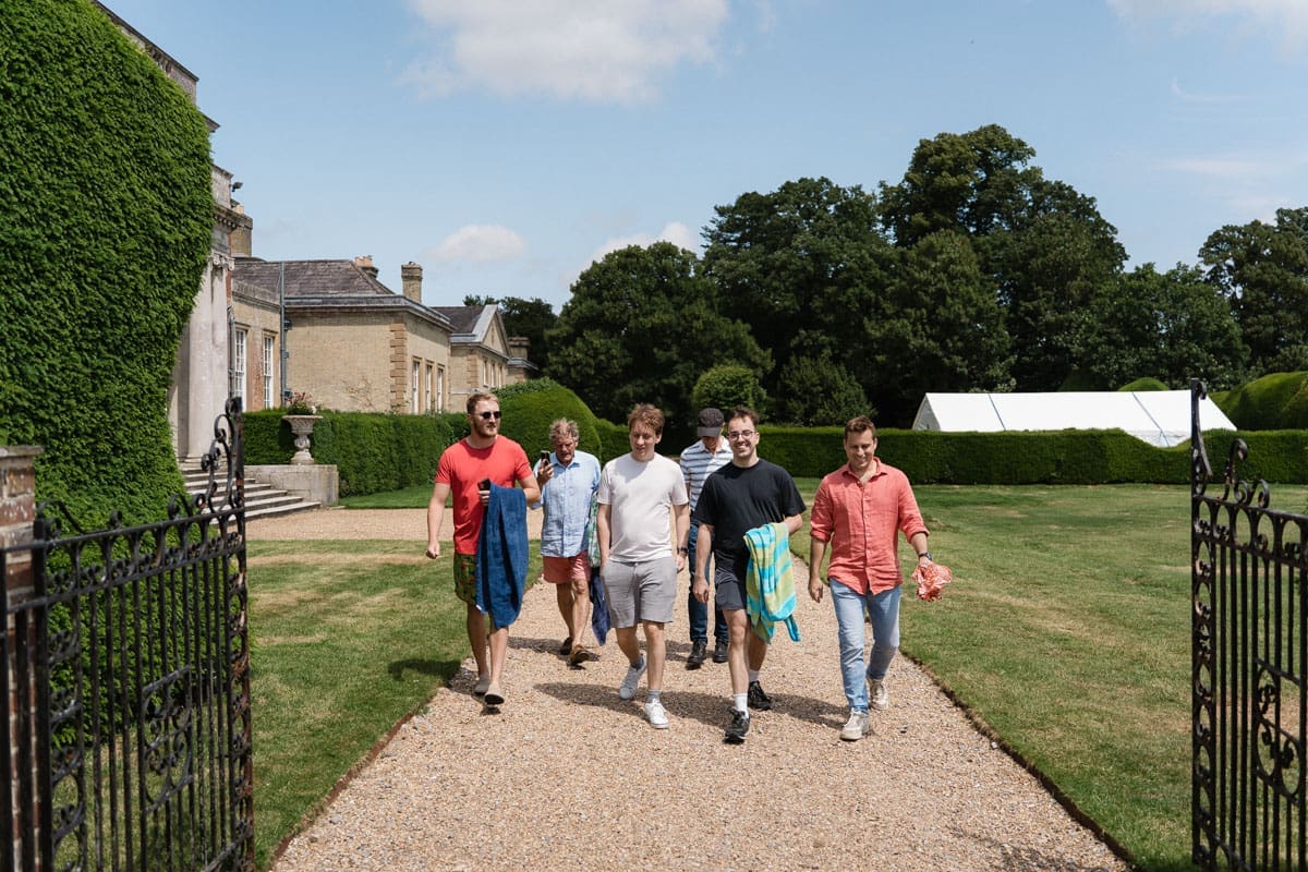 The guys have a quick swim before getting ready for the wedding