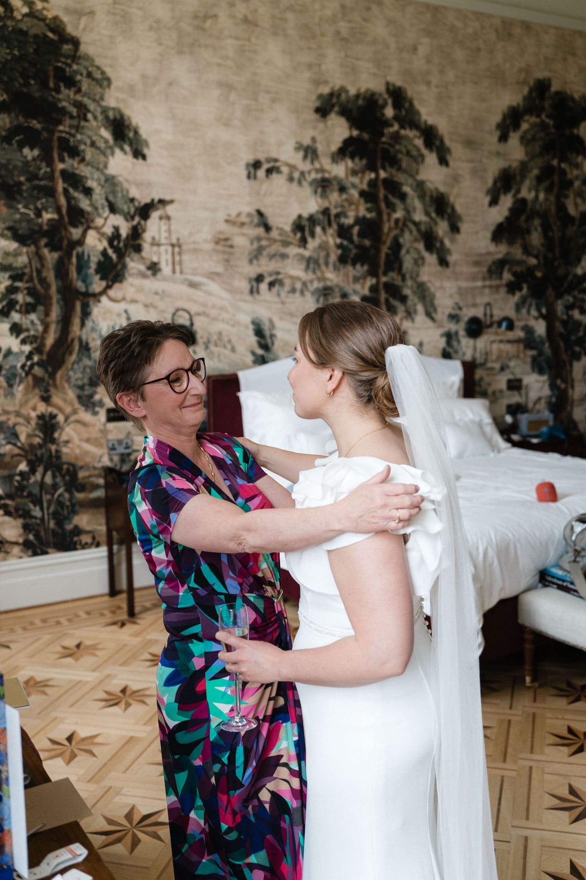 a moment between the bride and the mother of the bride