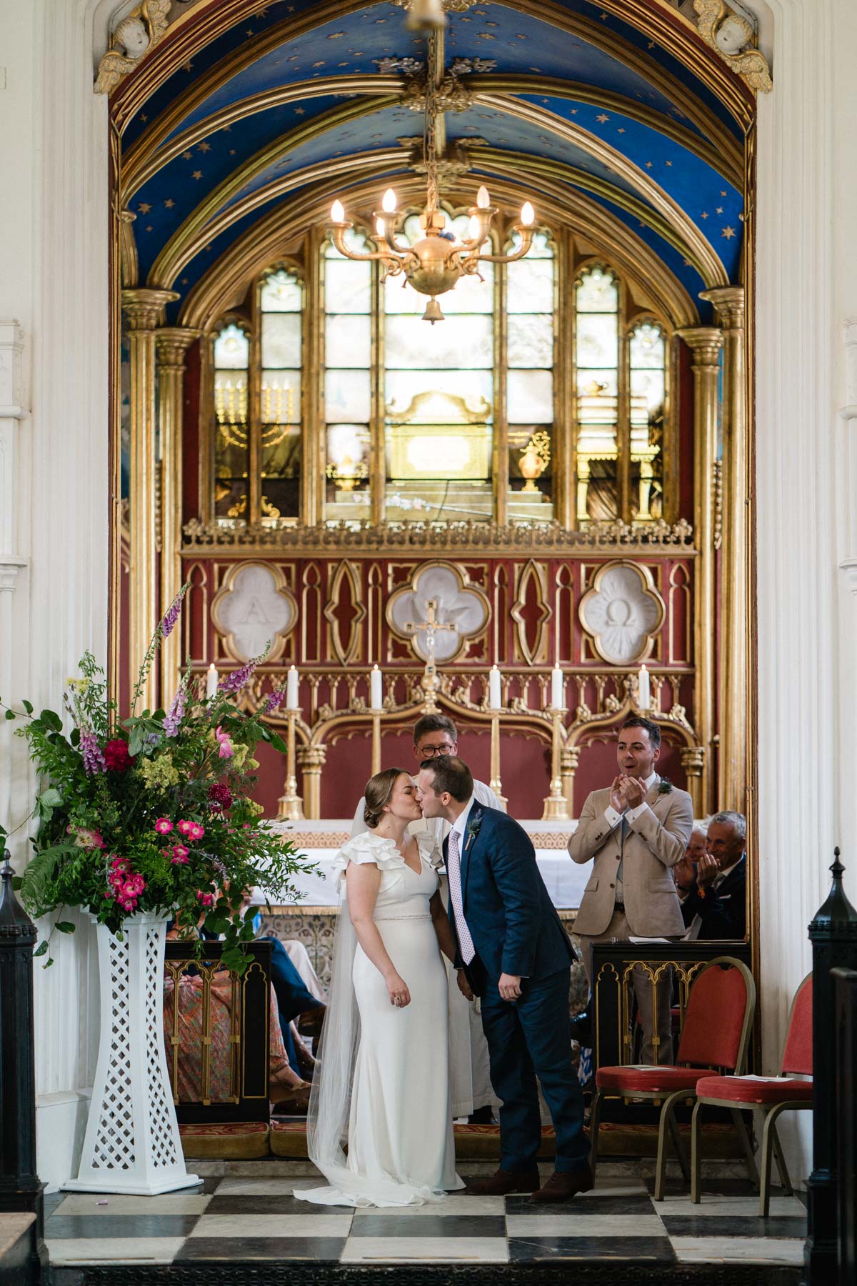 first kiss between the newly married bride and groom